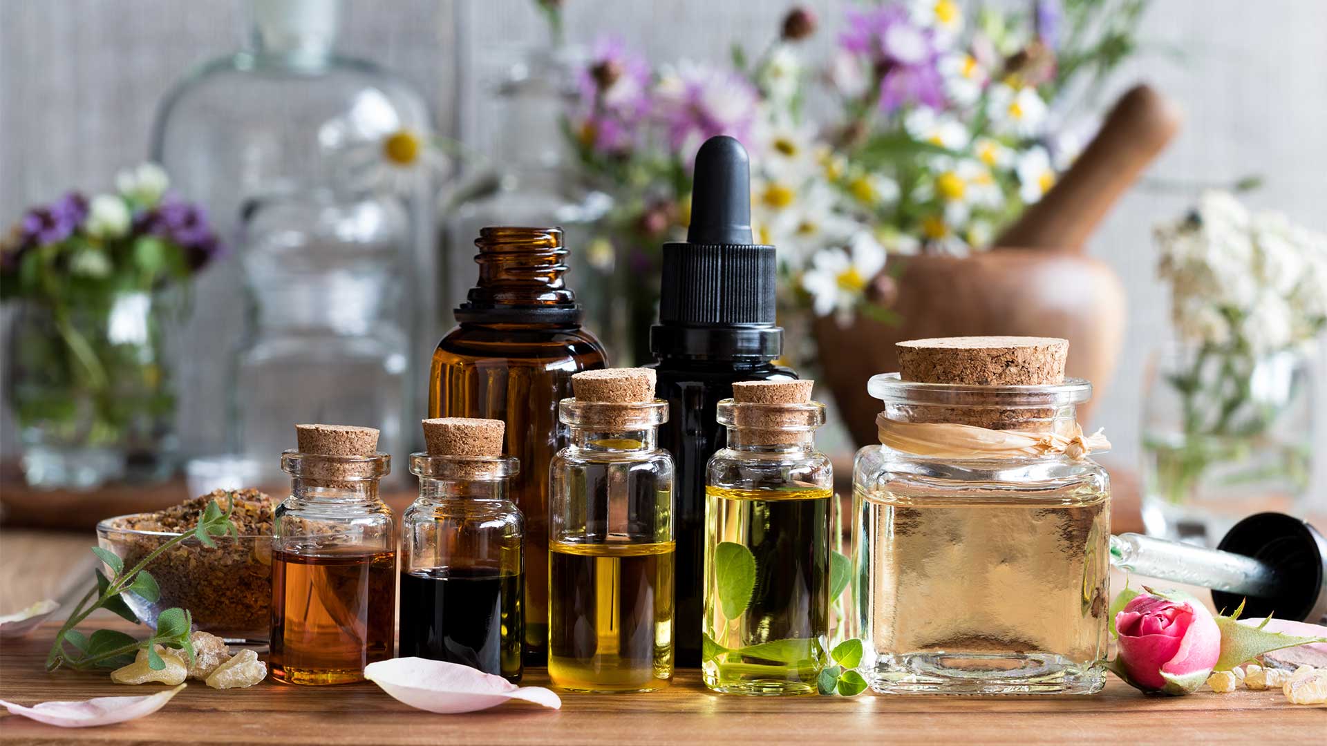 Bottles of essential oils used to make fragrances at top perfume brands in Singapore