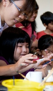School kids painting in ArtScience Museum