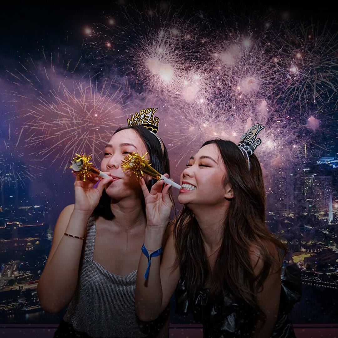 Two ladies celebrating New Year's Eve at LAVO, Singapore