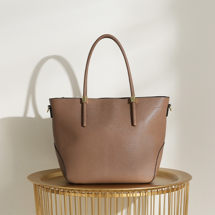 A luxury branded bag in brown