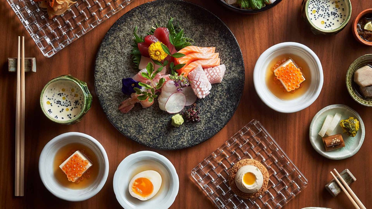 Assorted sashimi platter and sides with tofu and egg at Wakuda