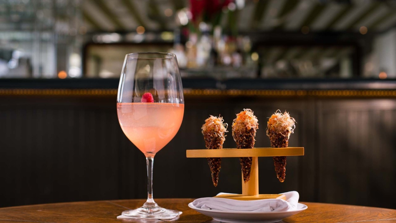 Cocktail and Tuna Cones from Spago Bar & Lounge, a restaurant by Wolfgang Puck