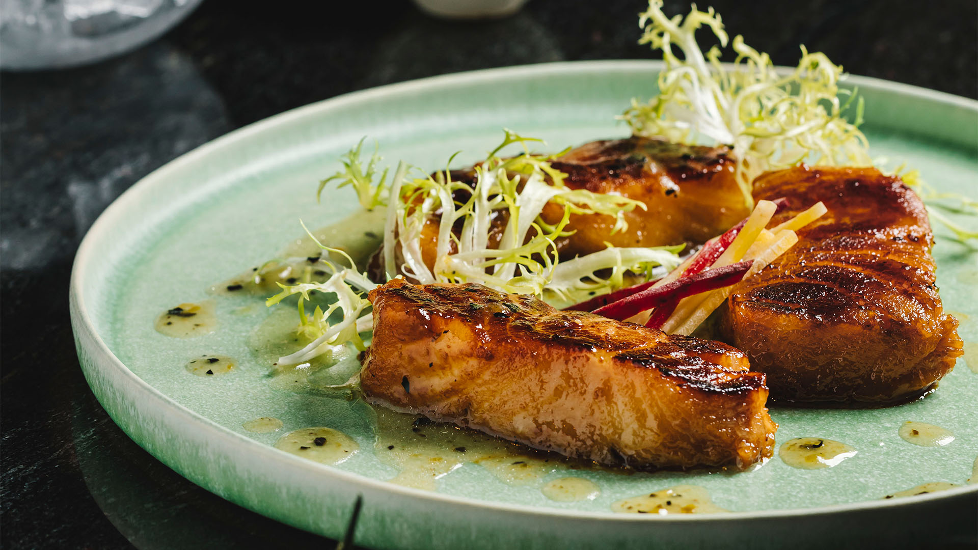 Miso Marinated Black Cod, a signature dish to enjoy at KOMA before catching a musical at Sands Theatre
