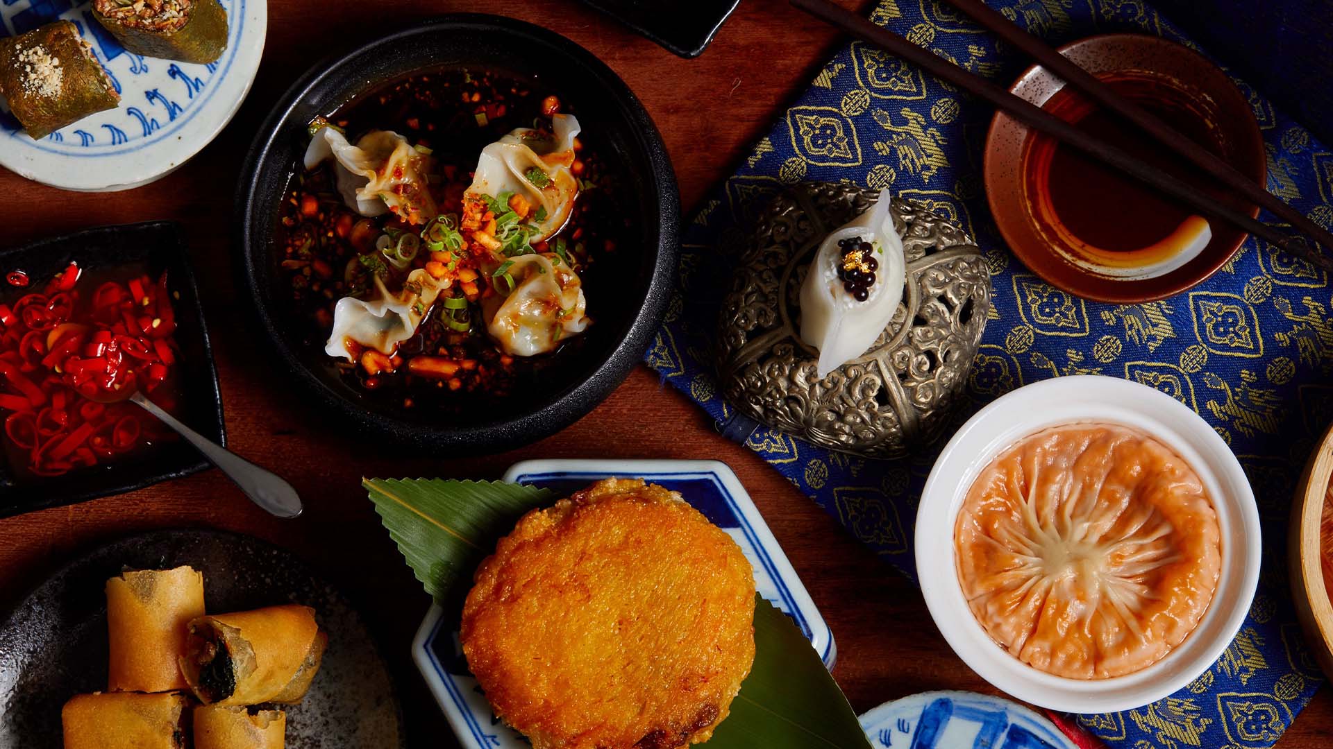 Dim sum on spoons and chopsticks