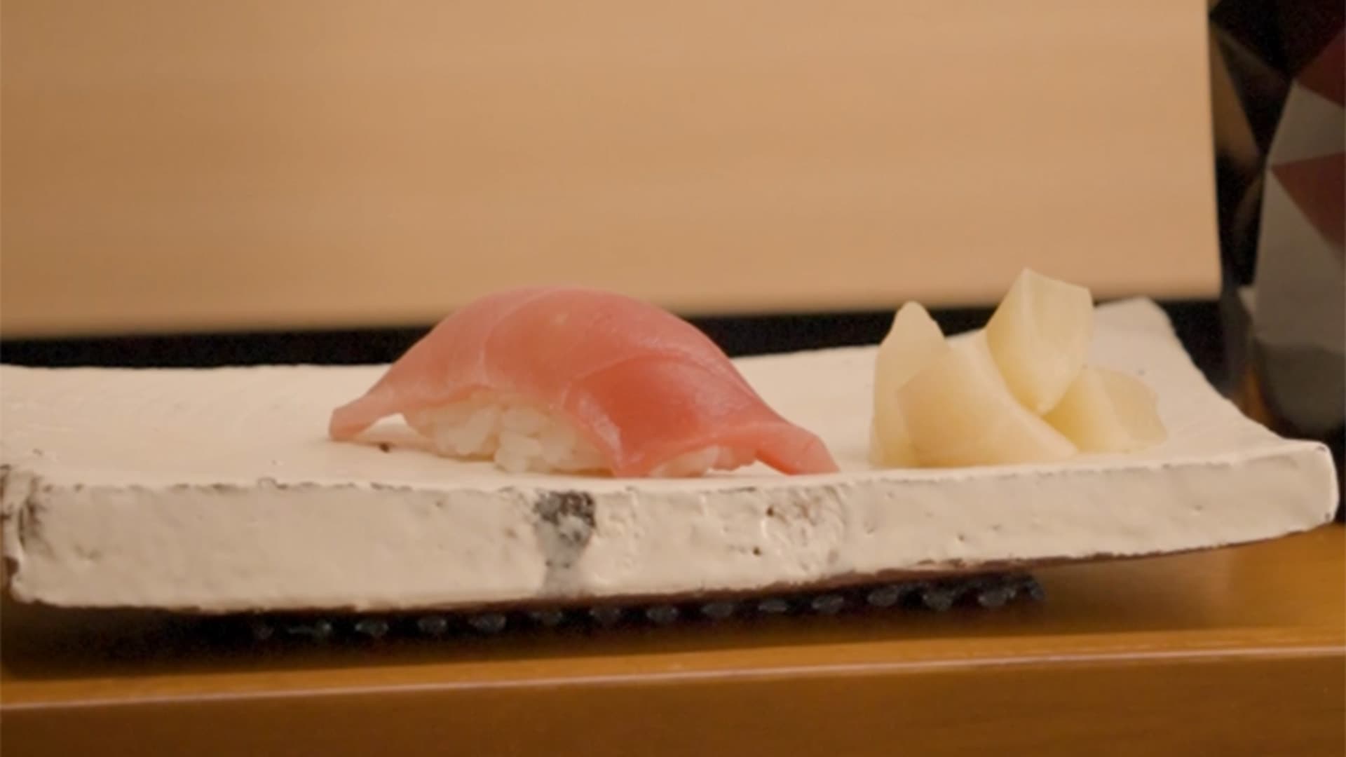 A nigiri sushi presented during an omakase dinner at Wakuda