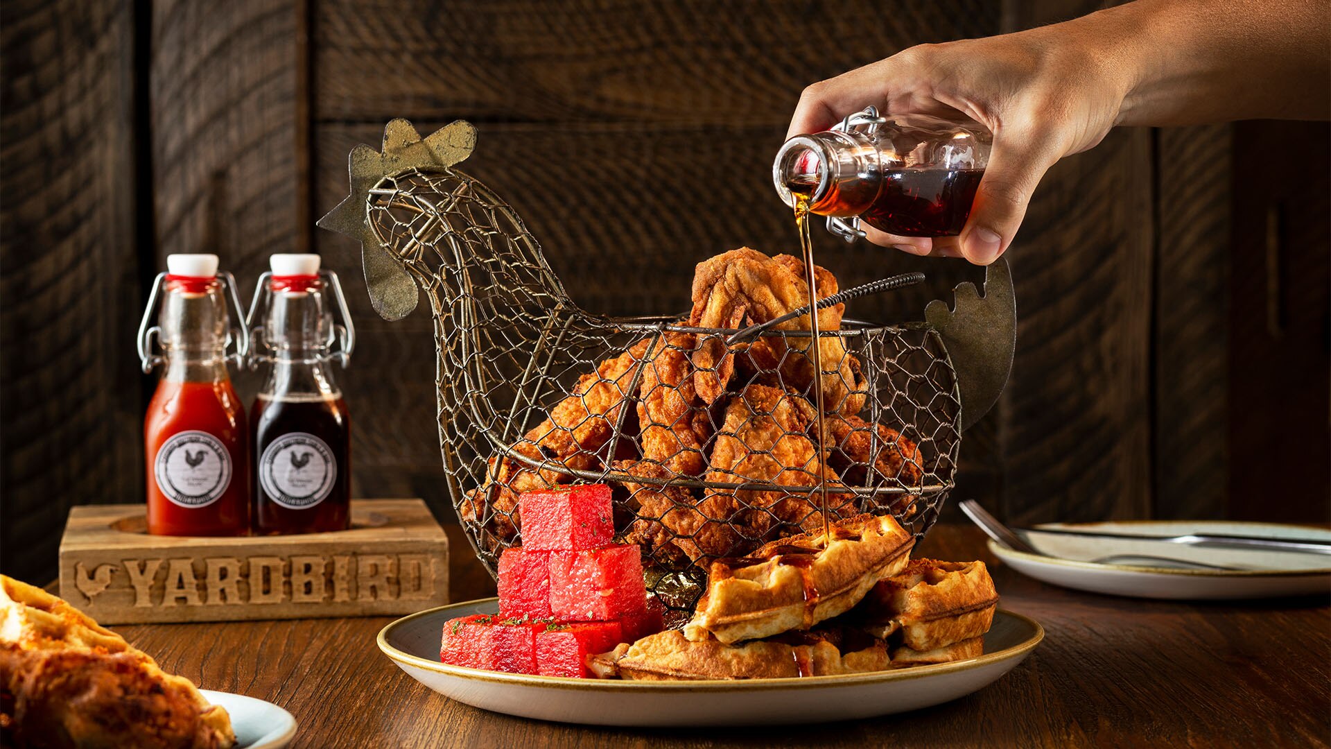 Chicken & Waffles at Yardbird, a pe-friendly spot with outdoor dining area in Singapore