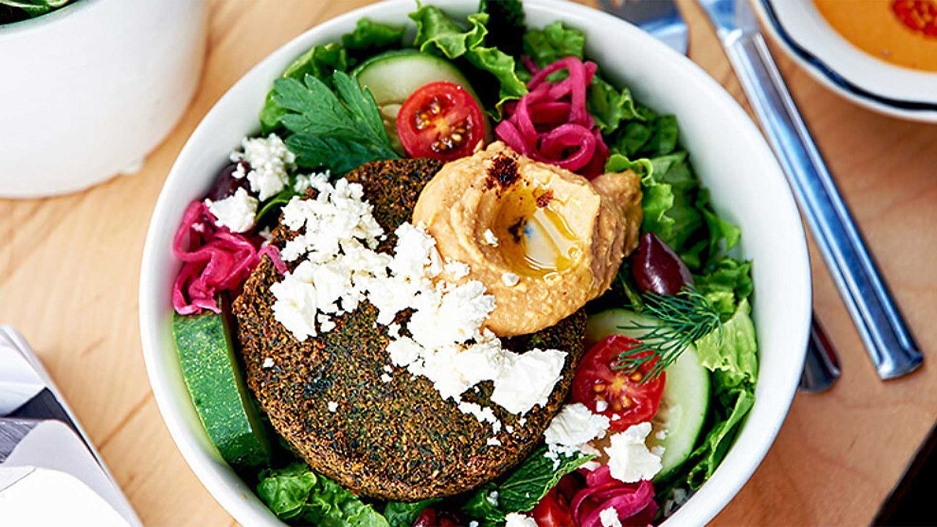 Salad with cherry tomatoes, beetroot and vegetables, a vegetarian-friendly meal at Black Tap Craft Burgers & Beer