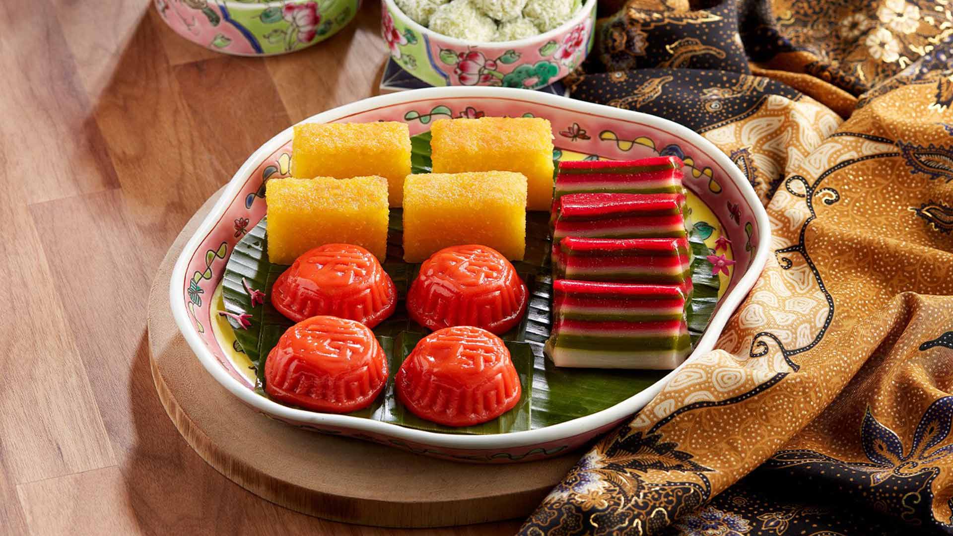 Vegetarian-friendly Asian kueh plated on banana leaves and handkerchief at RISE Restaurant, Marina Bay Sands