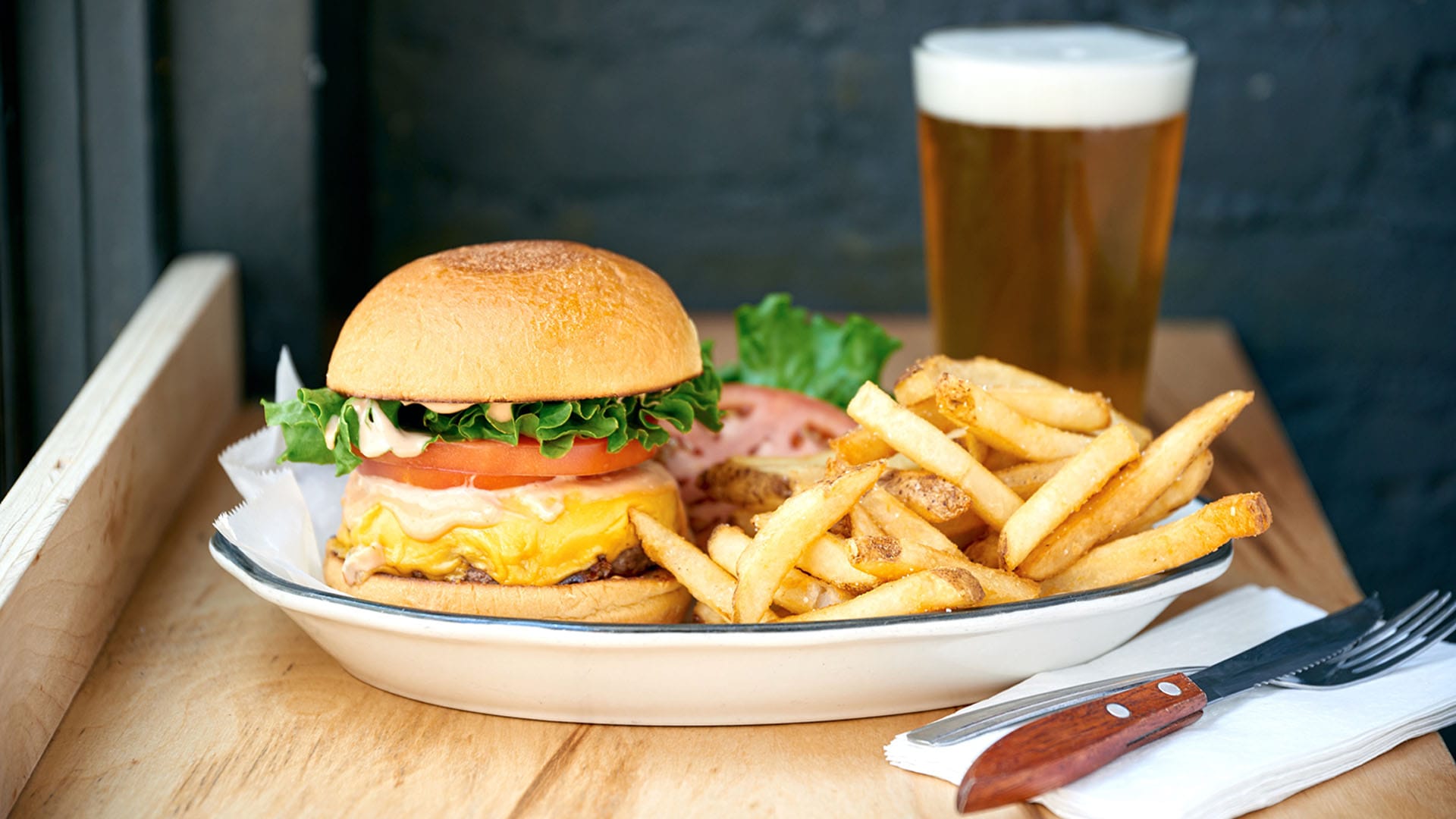 Burger and beer from Black Tap, a western casual dining restaurant in Singapore