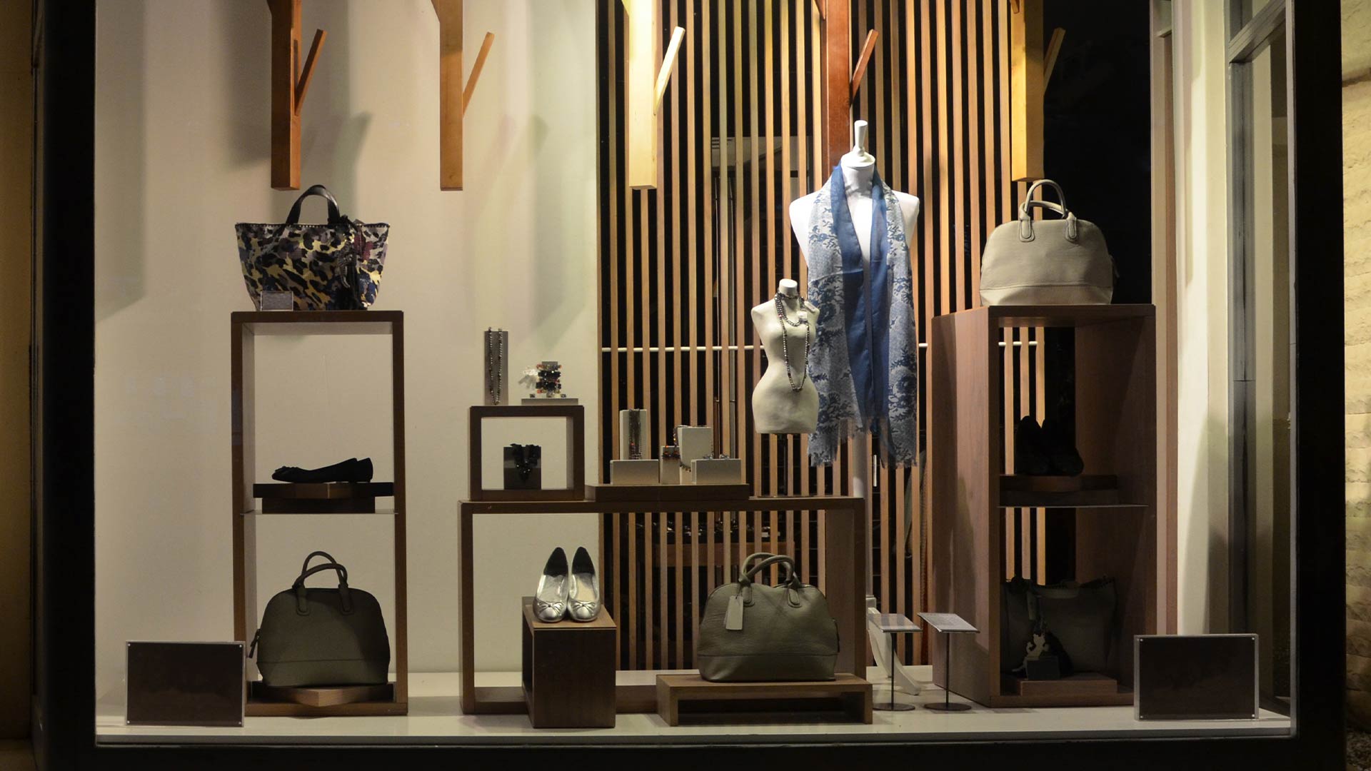 Bags, accessories and apparel from a luxury fashion brand on display