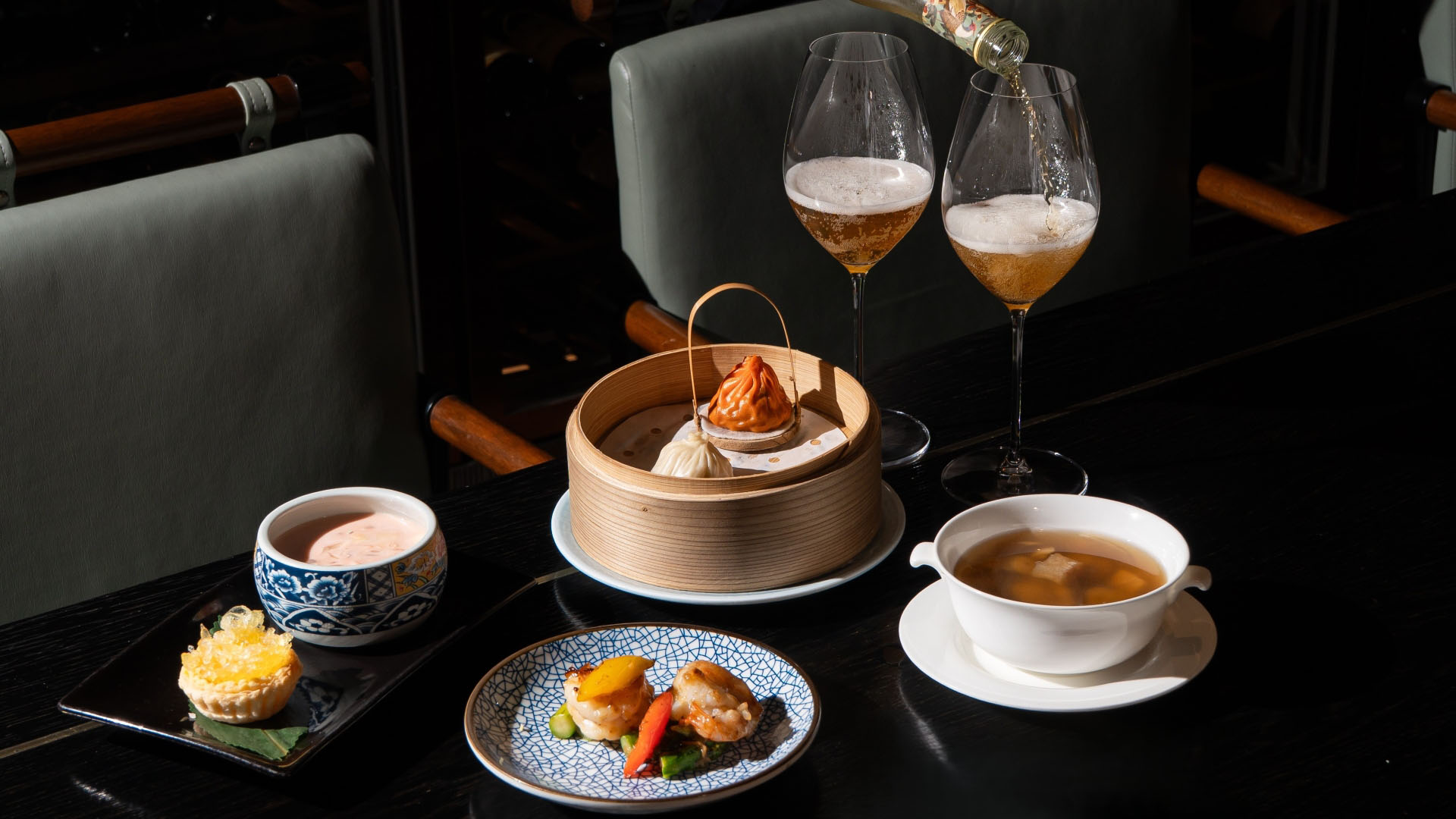 Applewood Smoked Pluma Iberico Pork, a popular dish that will impress Dad on Father's Day dinner at Mott 32