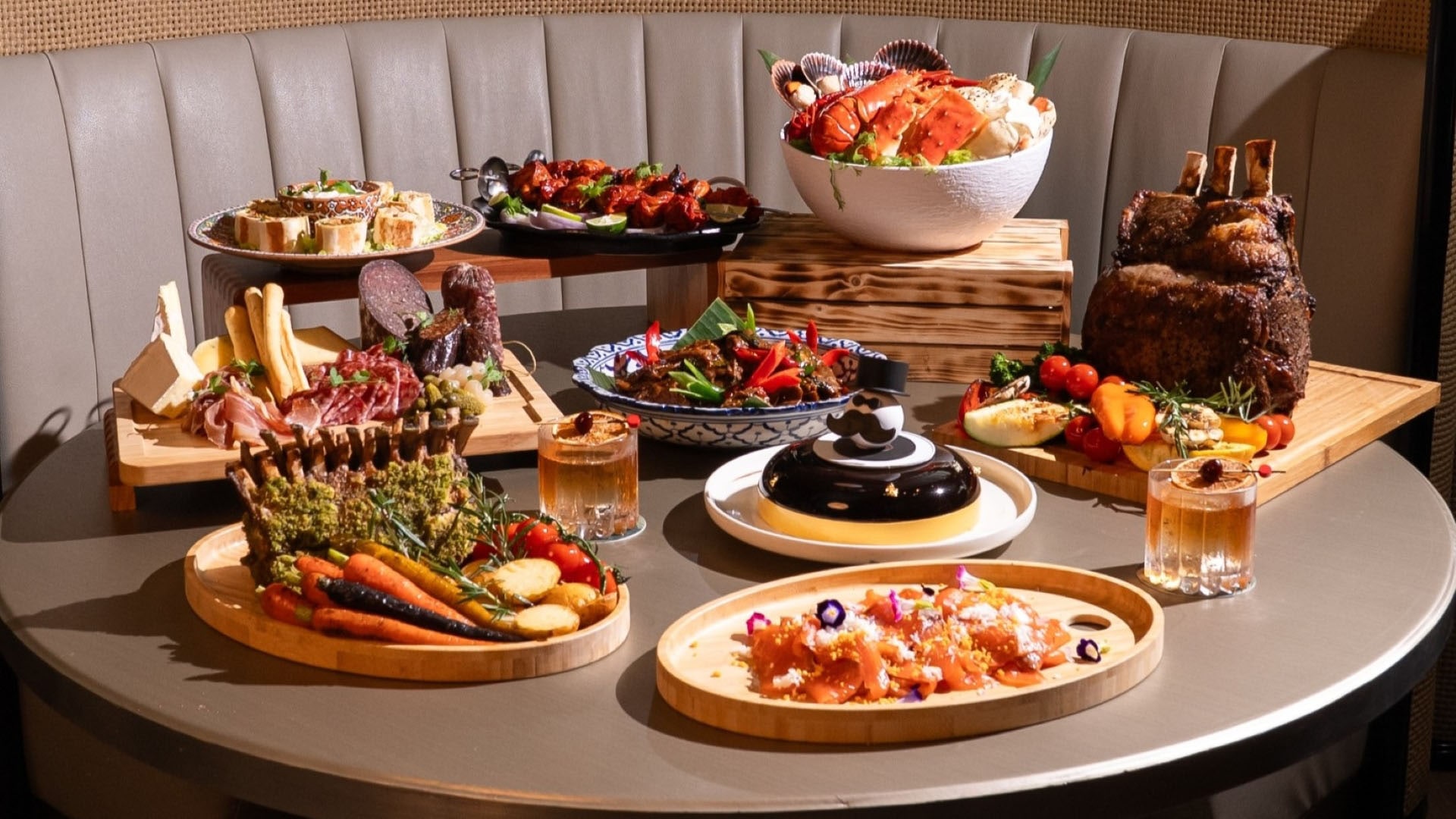 A family of 3 enjoying a seafood brunch buffet to celebrate Father's Day in Singapore