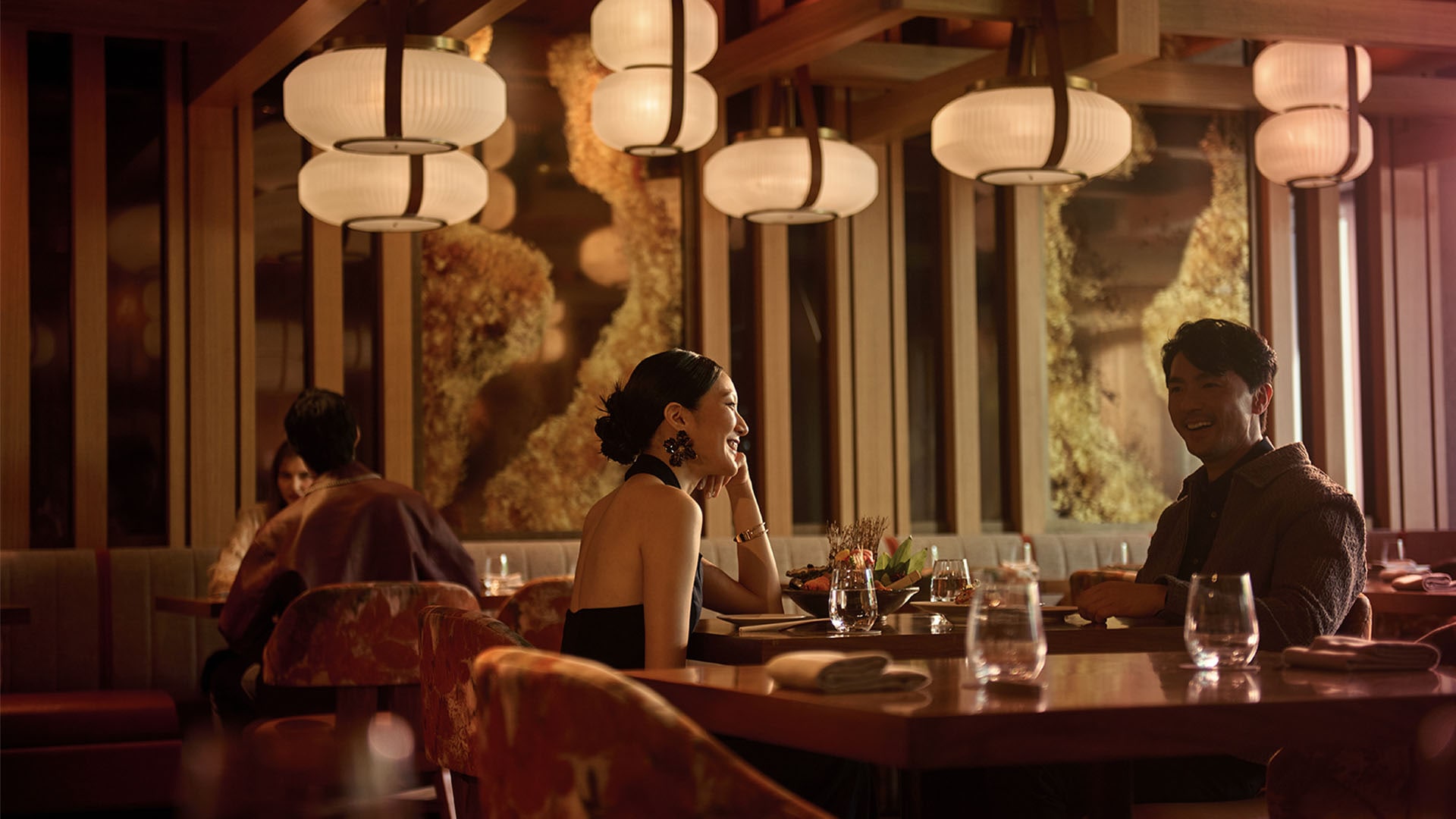 Couple dining at Wakuda, a Japanese fine dining restaurant in Singapore 