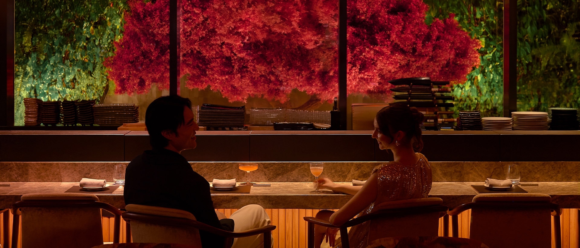 Couple celebrating 2026 Valentine's Day at a restaurant