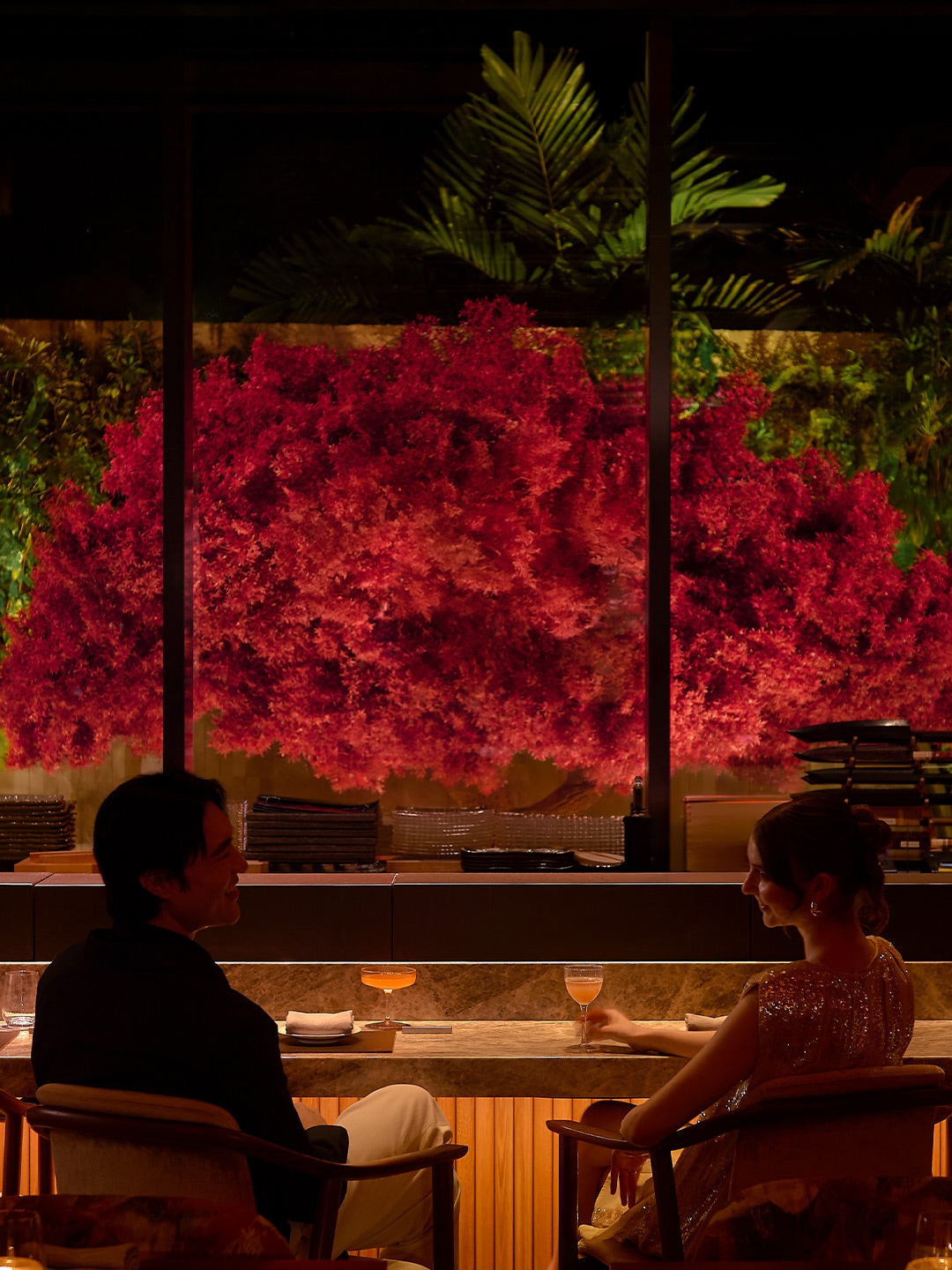 Couple celebrating 2026 Valentine's Day at a restaurant