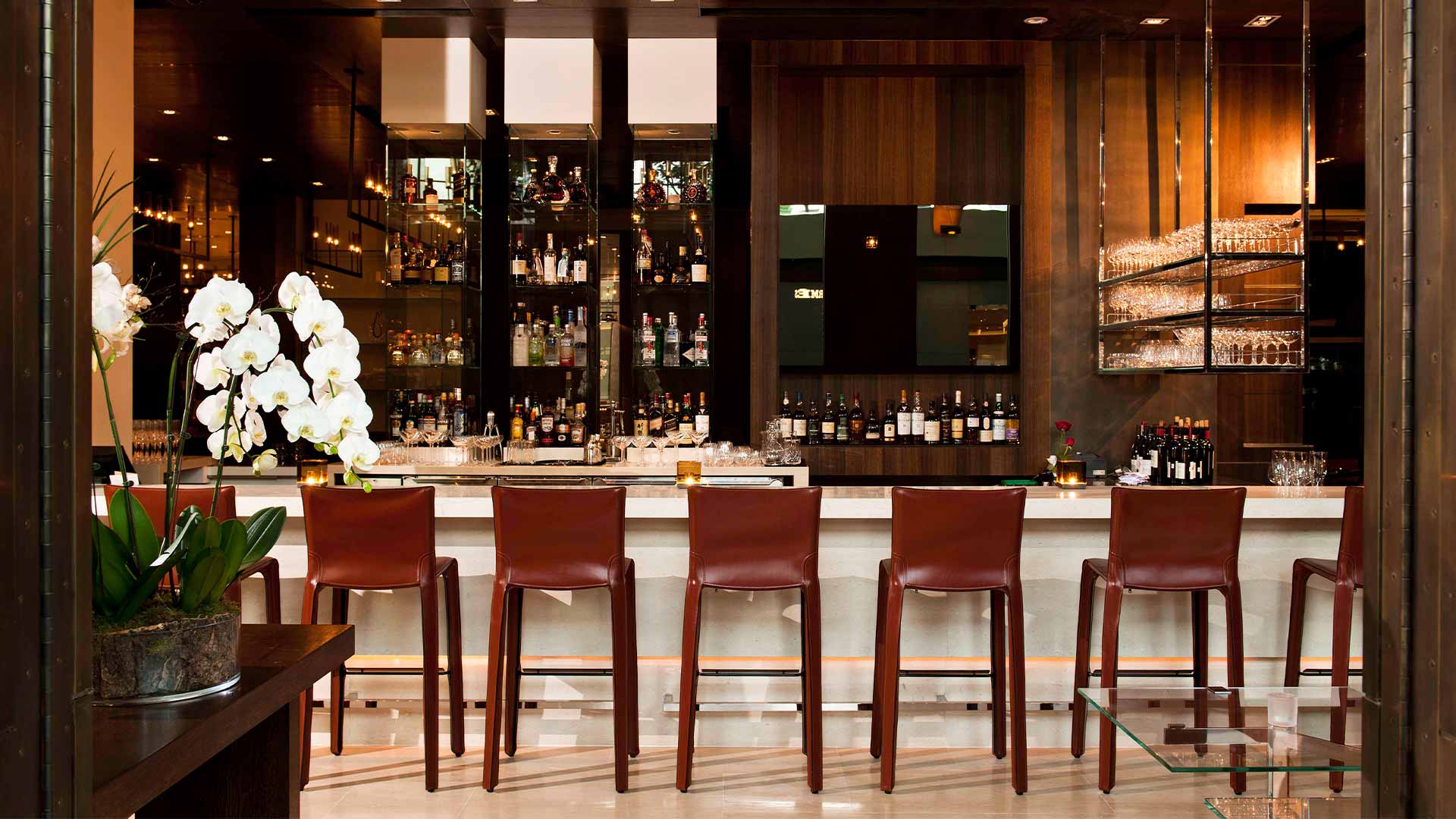 Entrance and bar seats at CUT Singapore, where private events are held