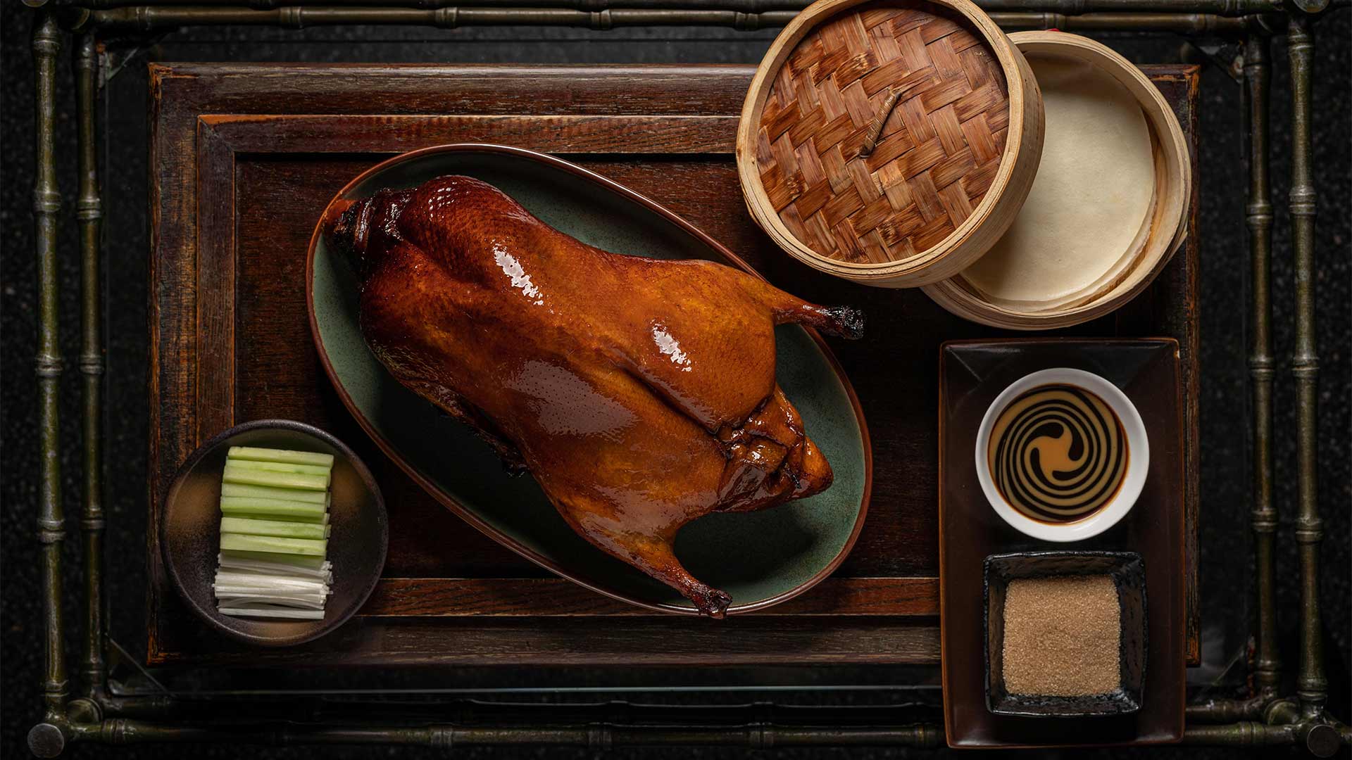 Apple wood roasted peking duck served at Mott 32 Singapore, for a private event