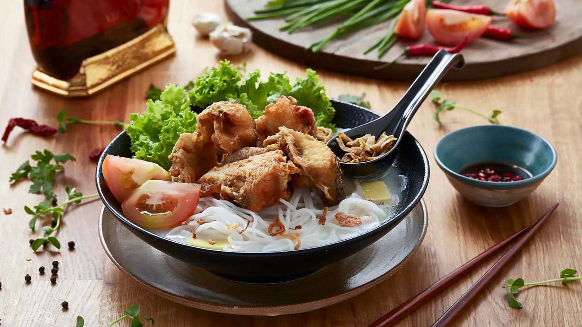 A bowl of fish soup at Rasapura Masters, a food court with multiple casual dining options