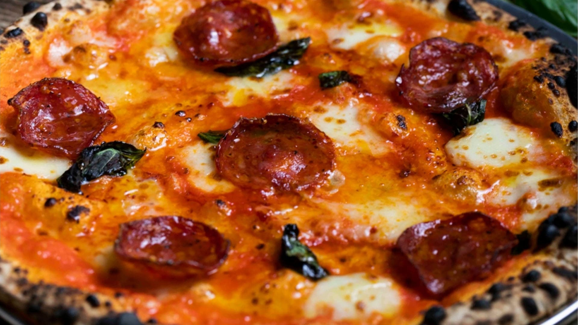 Oven-baked pizza at a casual dining pizzeria in Singapore