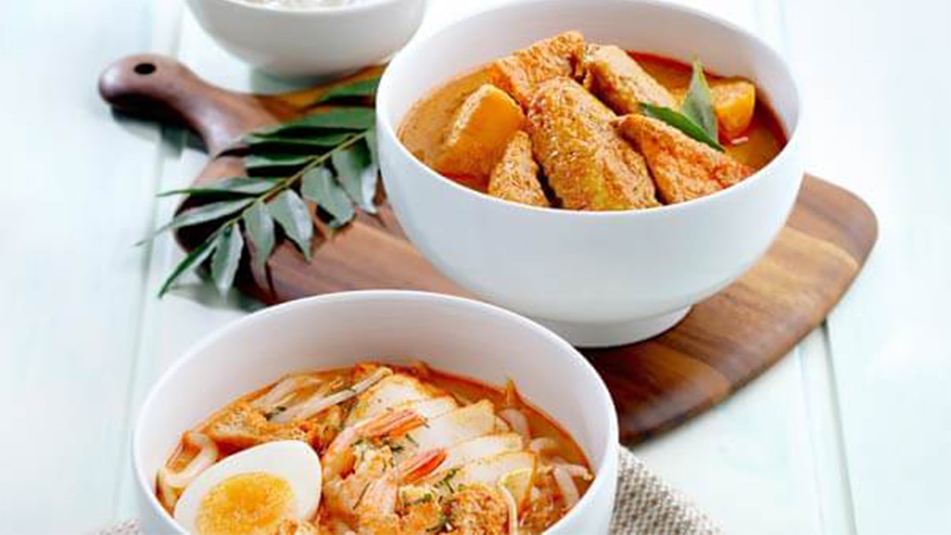 Laksa and Curry Chicken, local delights, served at Toast Box, a famed casual dining spot in Singapore