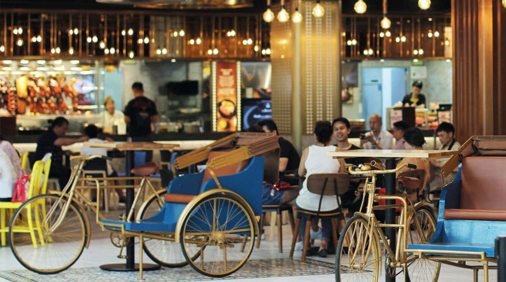 Rickshaw bikes at Rasapura Masters, a food court in Singapore serving traditional Singapore coffee (kopi)