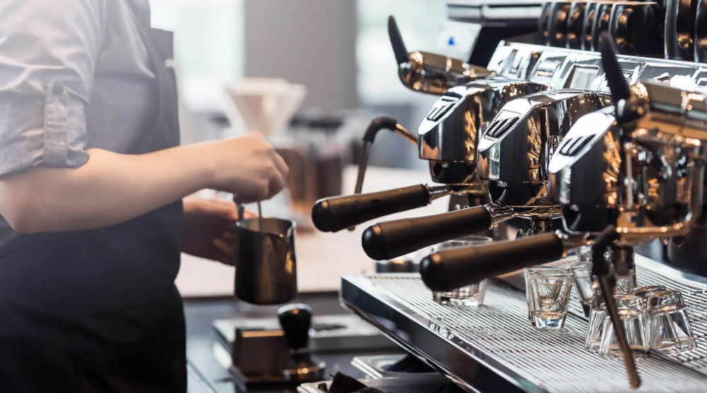 Barista brewing coffee at Starbucks Reserve, most recognised coffee cafes in Singapore
