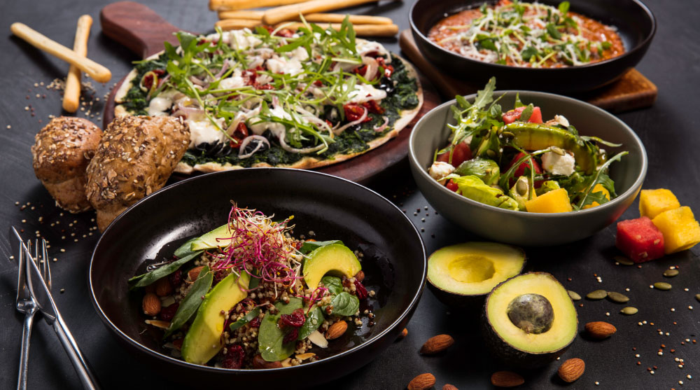 Vegetarian-friendly and gluten-free food with avocado, veggies and an assortment of nuts at Bread Street Kitchen