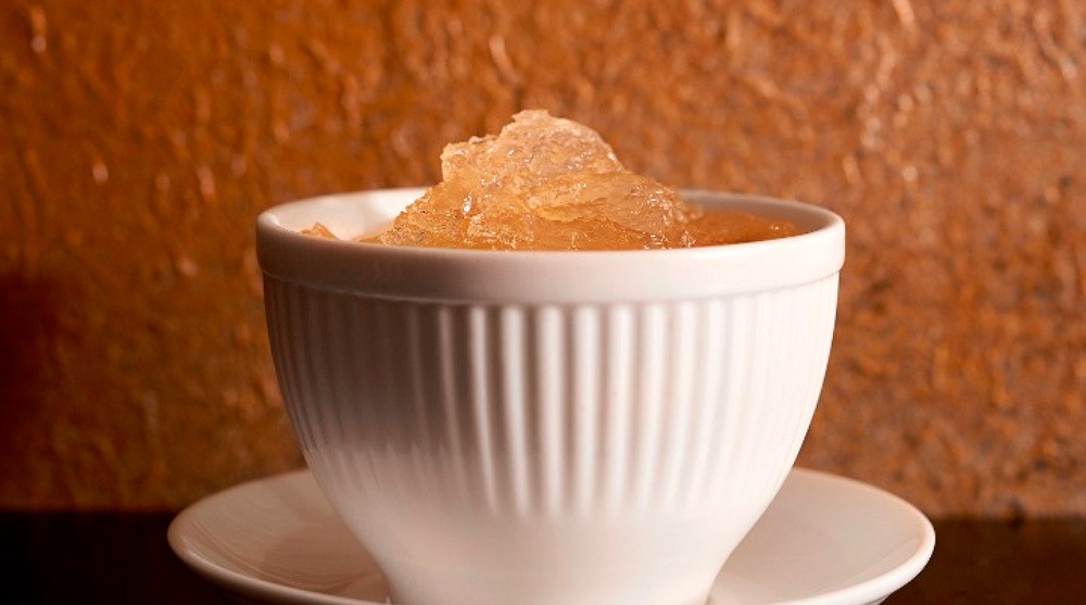 Chilled aloe vera jelly, a vegetarian-friendly dish, in a white porcelain bowl served at Imperial Treasure, Singapore