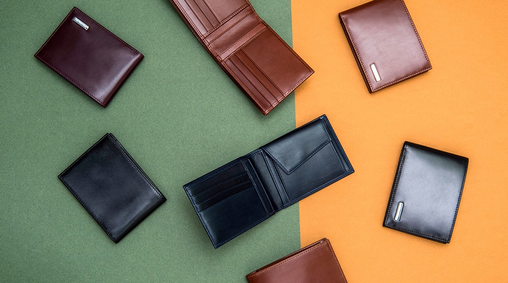 Men leather wallets at Coach, a gift for dad on Father's Day