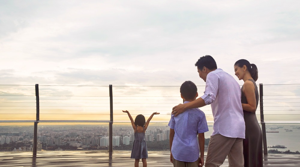 Family enjoying the view of downtown Singapore on Mother's Day, at the SkyPark Observation Deck