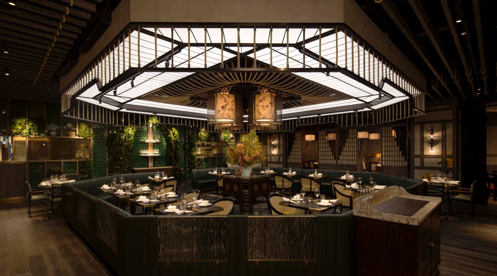 A dimly lit fine dining space at Mott 32, perfect for a Valentine's dinner date