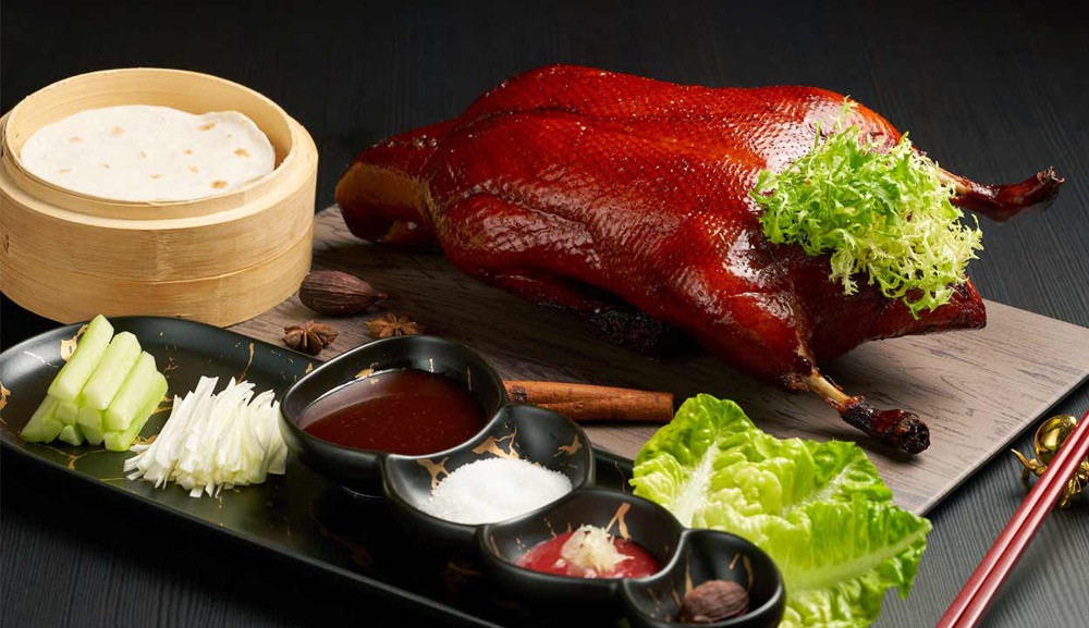 Well glazed Peking Duck served at BLOSSOM, a fine dining restaurant in Singapore