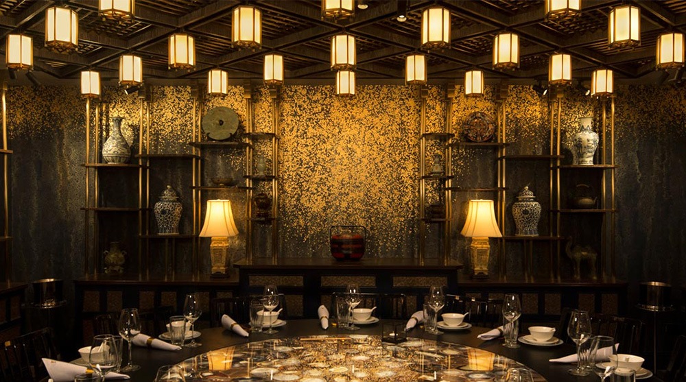 An instagrammable fine dining space with fine cutleries and wine glass lined up at Mott 32 Singapore, Marina Bay Sands