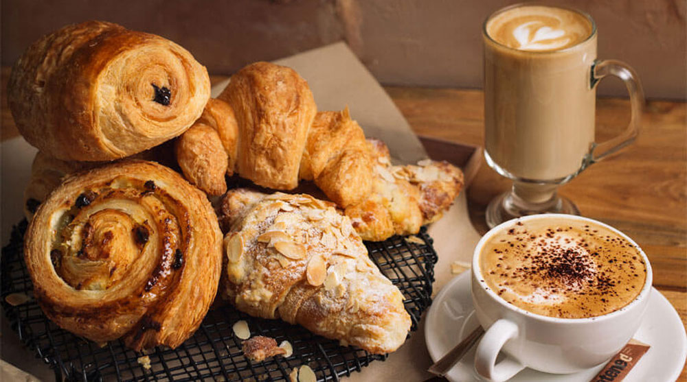 Pastries, latte and espresso served at Da Paolo Gastronomia, the best cafes in Singapore serving coffee