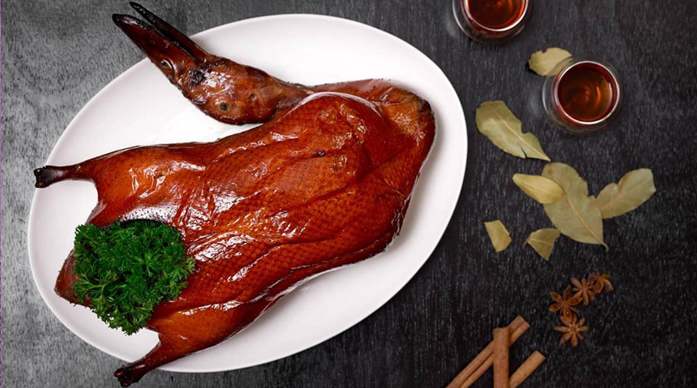 Glazed roasted duck for Mother's Day celebration at a fine dining Chinese restaurant in Singapore