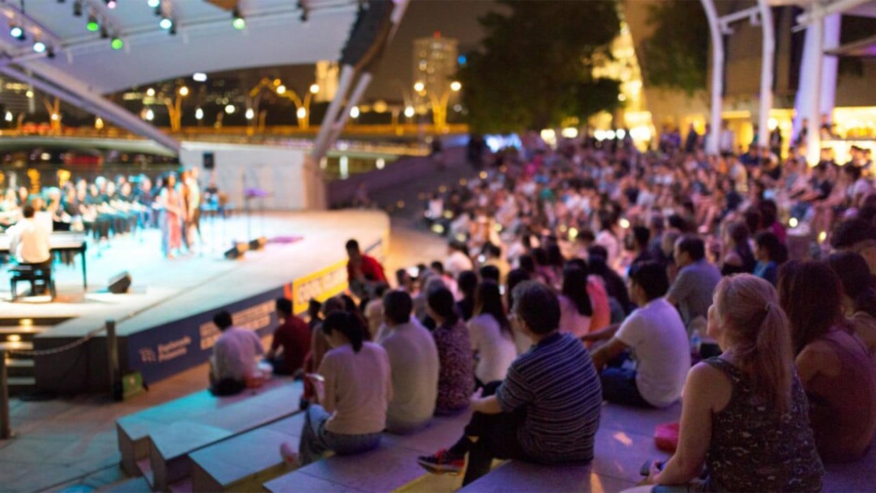 Crowd enjoying a festival event in Singapore, near Marina Bay Sands