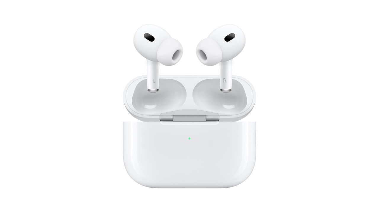 AirPods Pro, one of the best tech gifts, floating out of an open MagSafe Charging Case