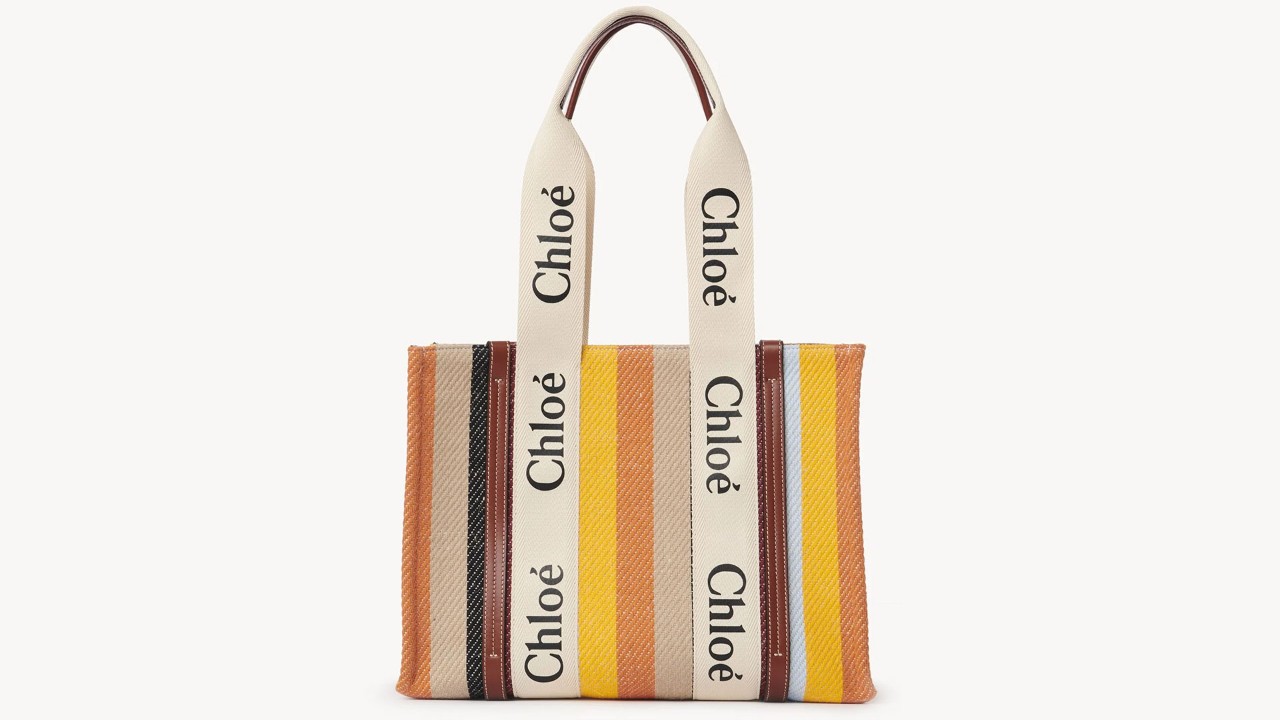 Branded tote bag in earthy tones with the luxury brand, Chloe on it