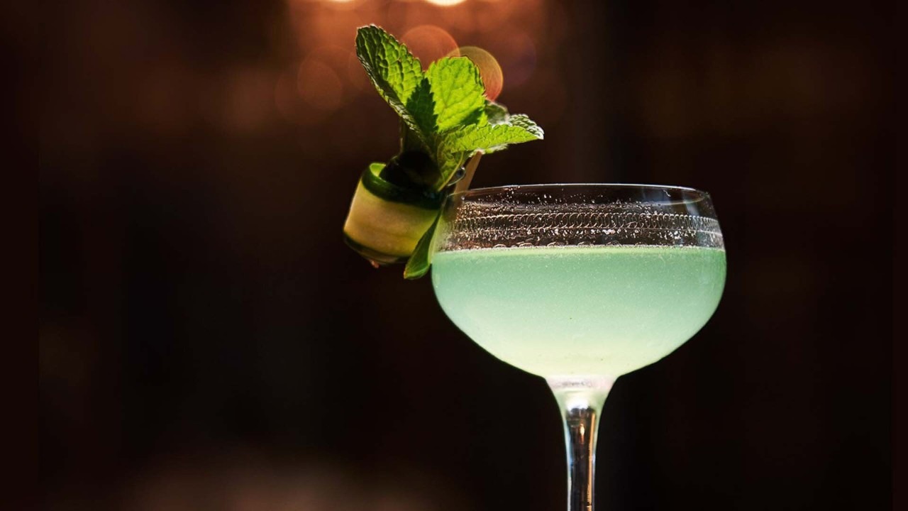 Green cocktail served at the best bars in Singapore at Marina Bay Sands