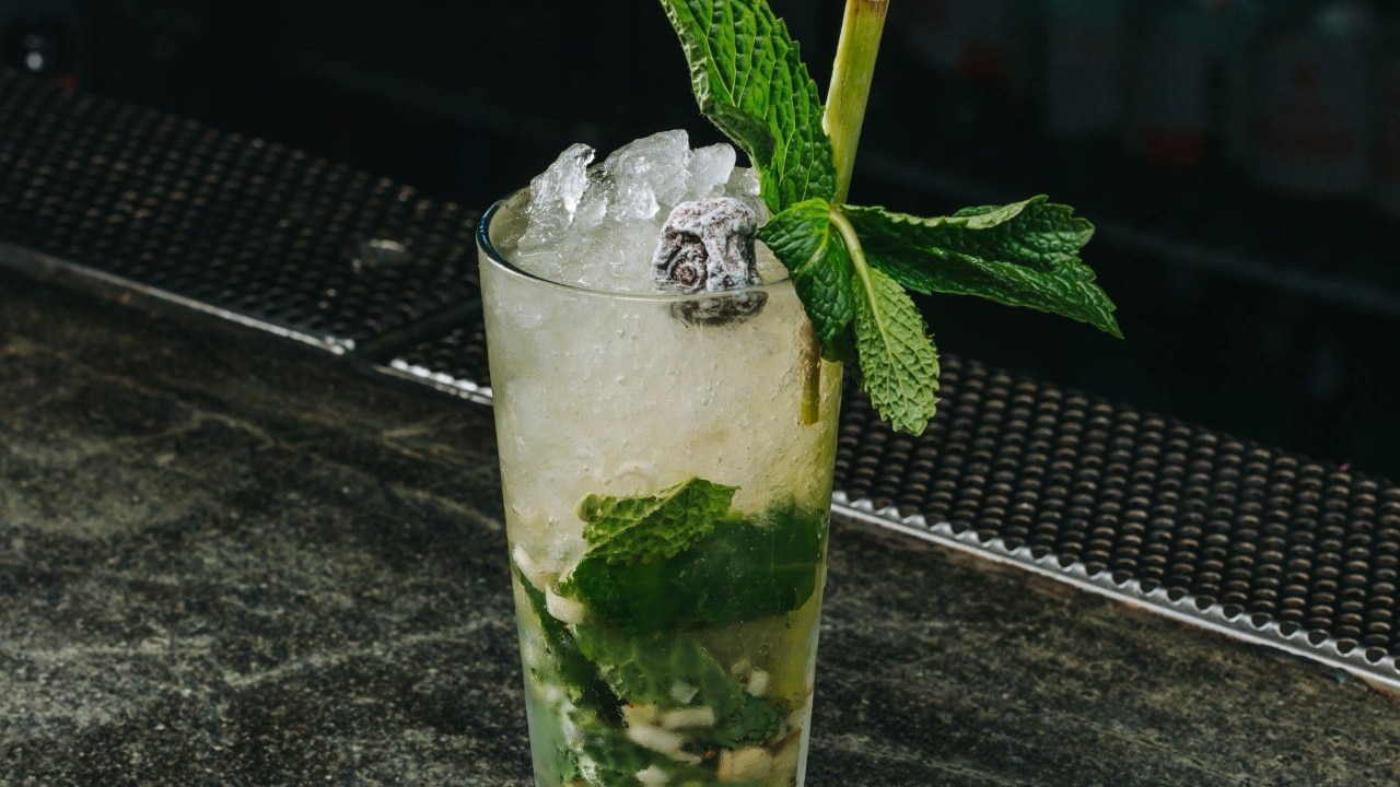 Cocktail served with peppermint leaves at the best bars in Singapore