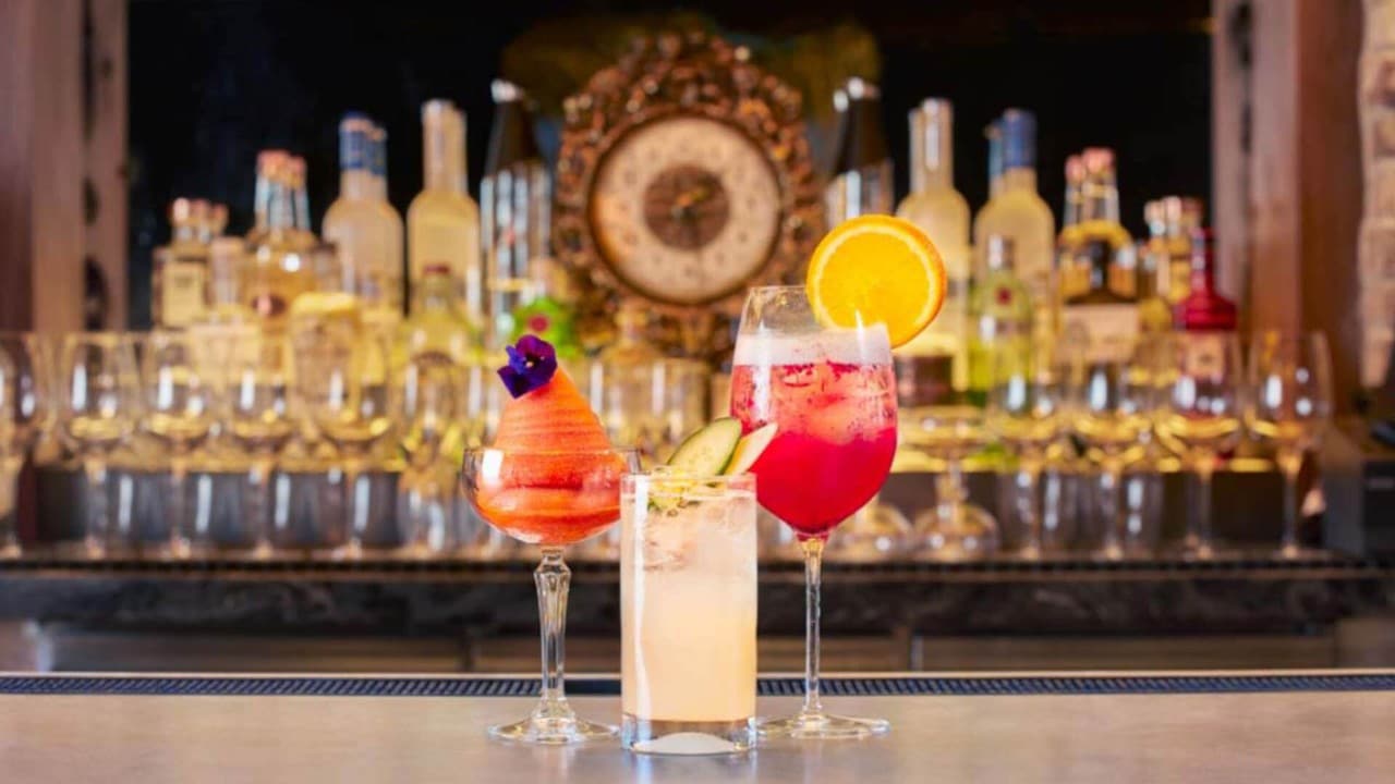 3 cocktails topped with fruits, served at the best bars in Singapore