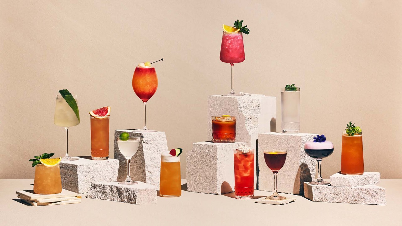 3 cocktails topped with fruits, served at the best bars in Singapore