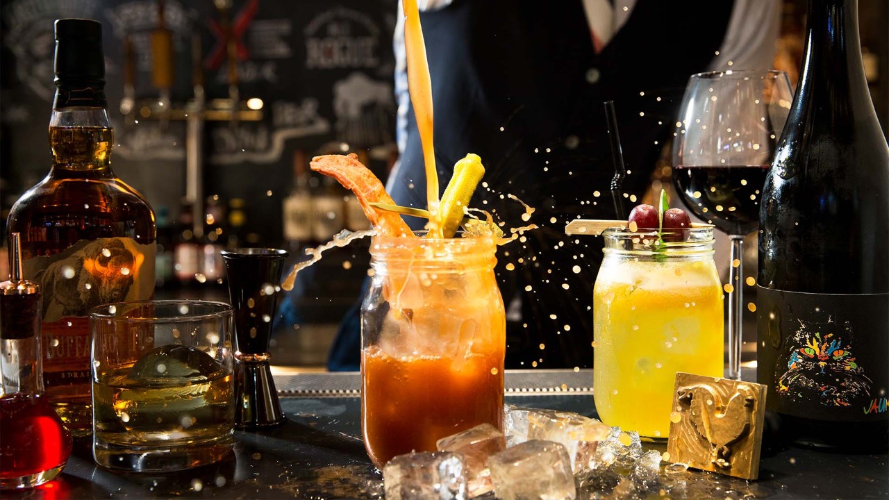 Cocktail with orange at the top bar in Singapore