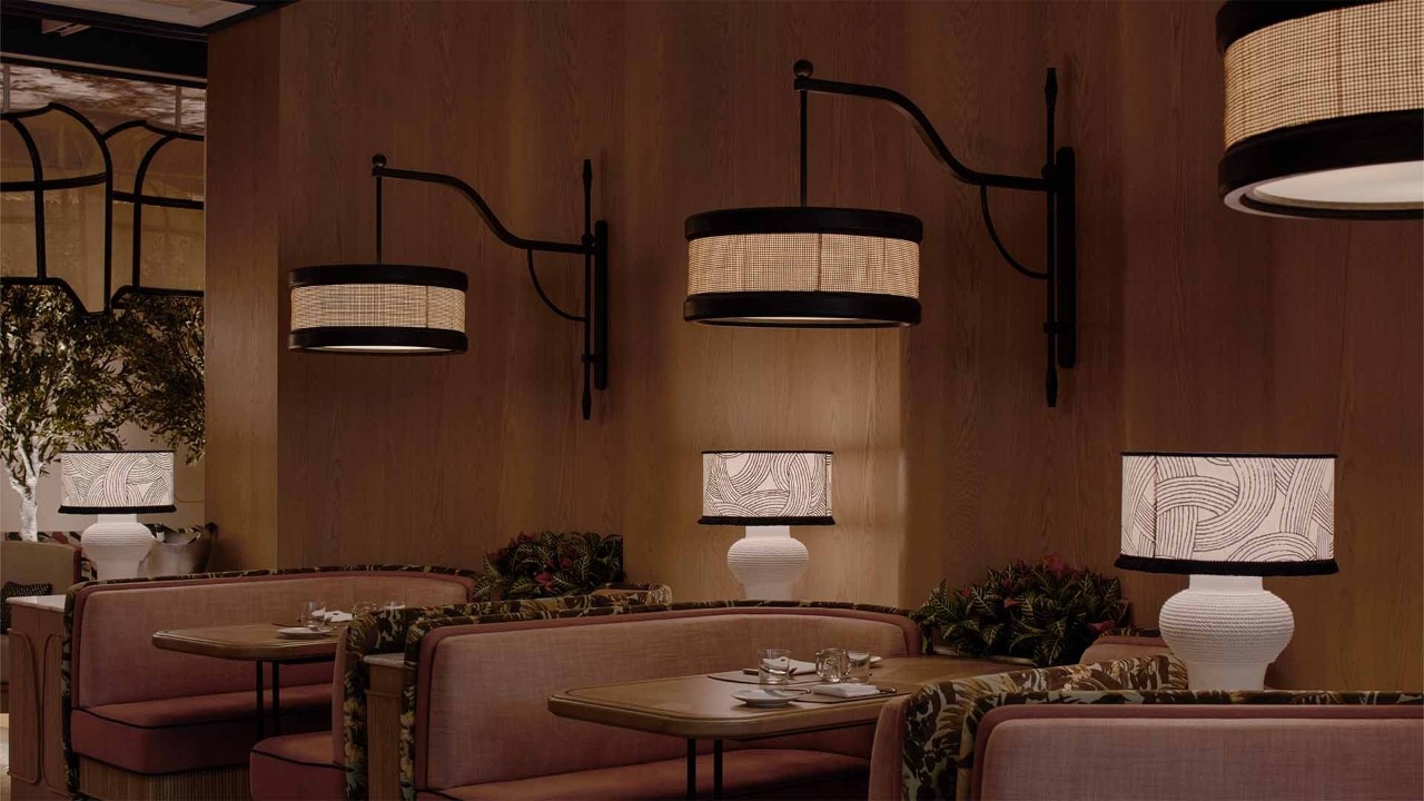 Dimly lit bar setting with bottles of liquor at instagrammable restaurant, Wakuda at Marina Bay Sands