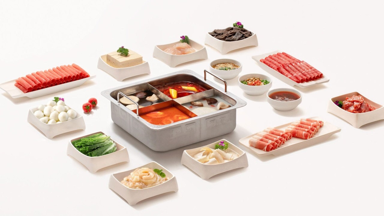 Hotpot with ingredients and soup bases at one of the best Chinese casual dining spot in Singapore, Haidilao
