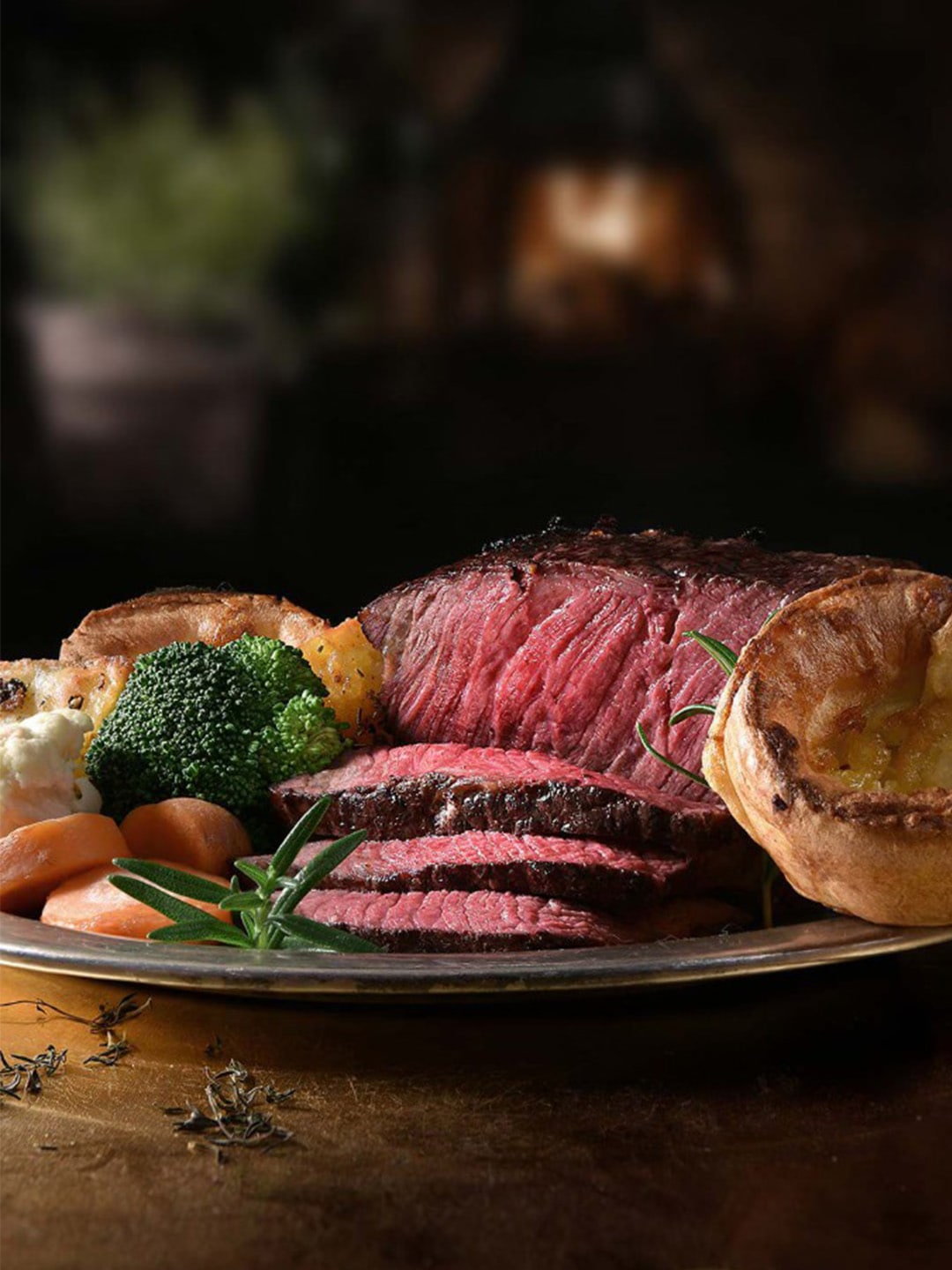 Roasted beef, potatoes and vegetables from RISE Restaurant, one of the best places for Sunday Roast in Singapore
