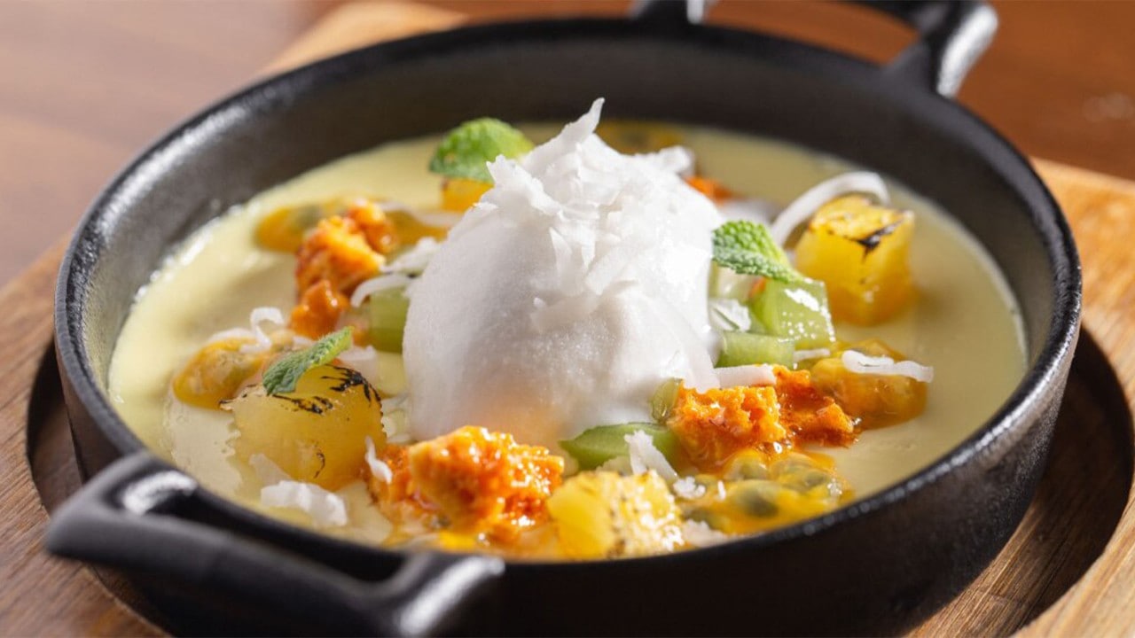 Vegetarian-friendly dish with passionfruit topped with fresh cream at Bread Street Kitchen by Gordon Ramsay, Singapore