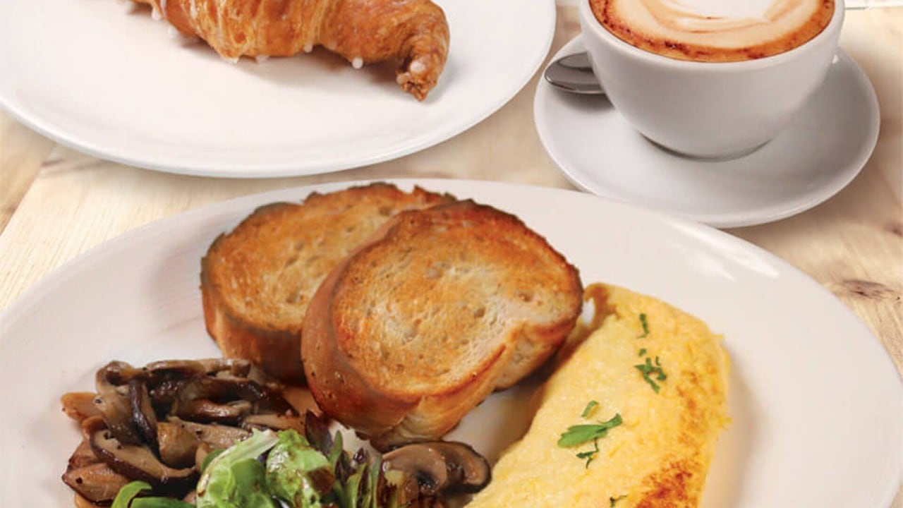 Omelette, toast and sauteed mushrooms for brunch in Singapore, at Marina Bay Sands