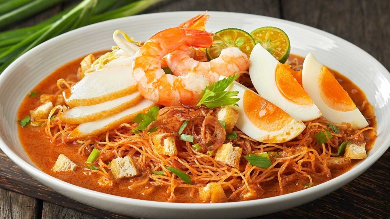 Mee Rebus, noodles topped with egg and prawns at a popular brunch spot in Singapore