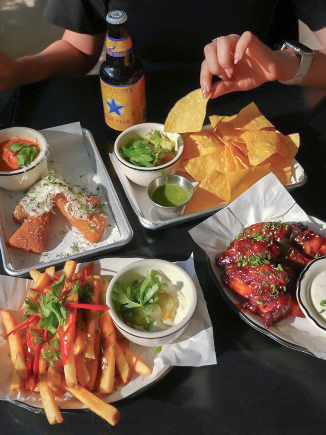 Nachos and french fries at Black Tap, one of the best casual dinner spots